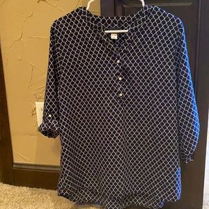 Navy and cream colored blouse